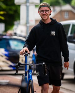 Niklas Strunk Team Storck Mrwbau walking with a bike 